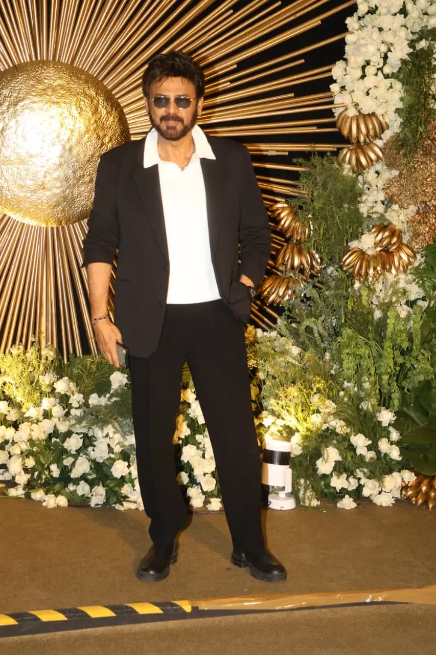 







Venkatesh Daggubati attended Vijay–Rashmika’s reception in a sharp all-black suit paired with a crisp white shirt.






